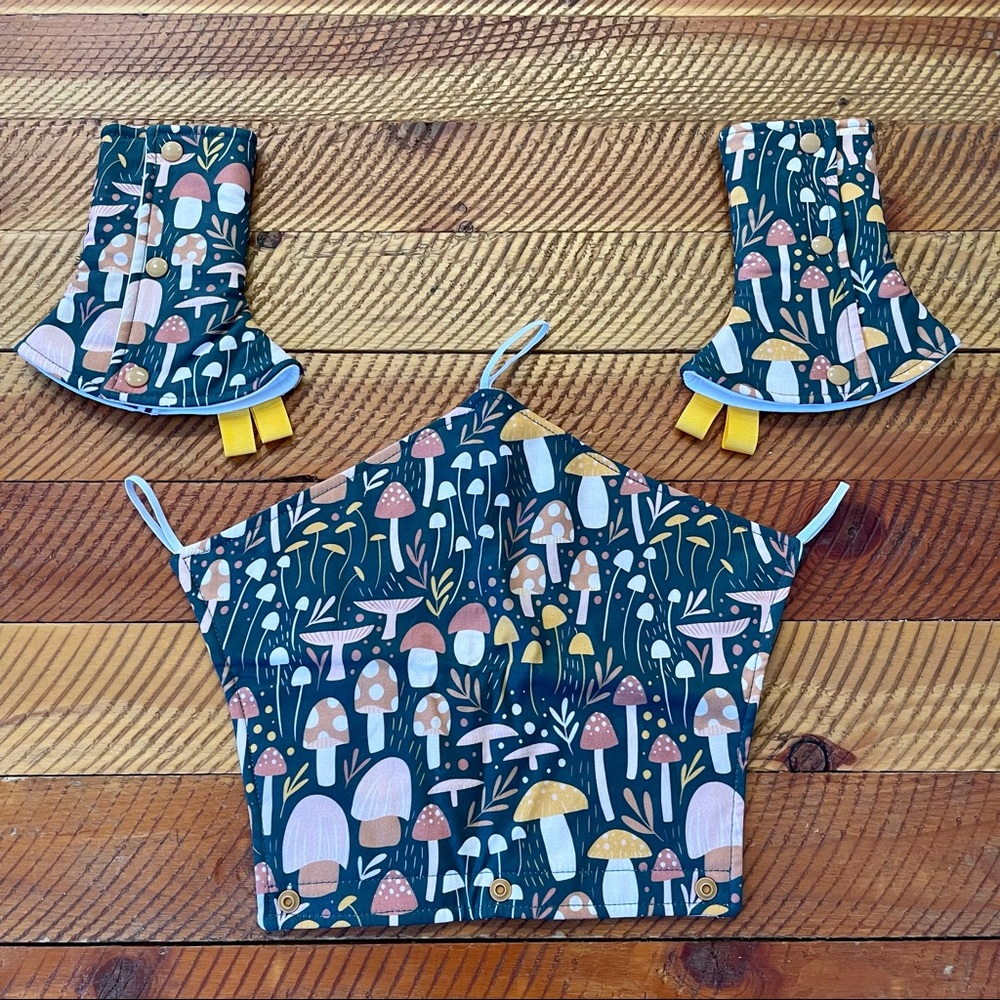 The Suckling Duckling Happy Baby Revolution Suck Pads and Drool Cover Mushrooms